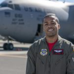 Capt. Jeff Jordan, 321st Air Mobility Operations Squadron, poses in front of a C-17 Globemaster III.