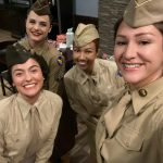 Selfie of four living history volunteers during the Women in the Air Force Association luncheon.