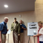 Outreach Team consisted of "Van" Van Dine (L), Sonya Shultz (R) and the Outreach Program Manager Dave Shultz tying down Lt. Halvorsen.