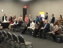 Program participants and nonprofits wait for the opportunity to hear from the Airman Heritage Foundation.