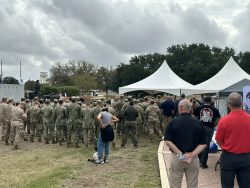 A crowd of representatives from the U.S. Armed Forces attend the Military Working Dog Teams National Monument commemoration.