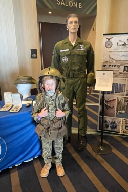 Young boy attends the AFSA Summit dressed in USAF uniform.